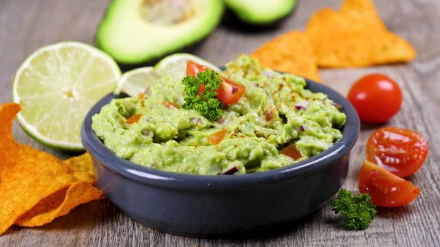 homemade guacamole and  tortilla chipas