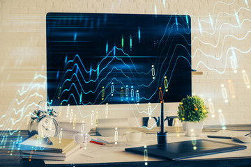 Forex market chart hologram and personal computer background. Multi exposure. Concept of investment.