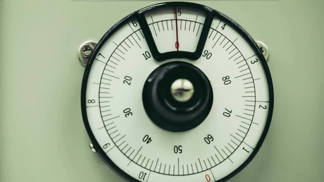 Old scale dial meter rotation from zero to ten round