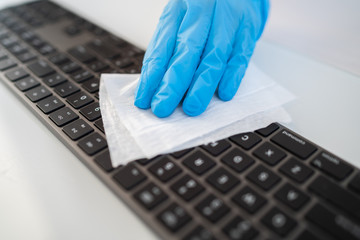 Covid-19 sanitizing office space wiping corona virus cleaning and disinfection of your workspace....