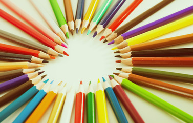 colored pencils lying around the heart