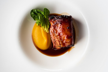 delicious baked pork belly with vegetable puree