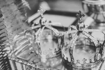 Golden crowns lying on the table in church