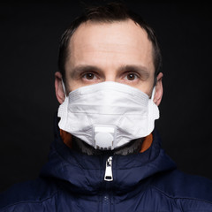 Man in mask . Protection against virus, infection.