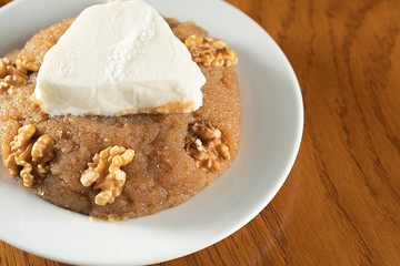 Turkish sweet food, irmik helvası with vanilla ice cream
