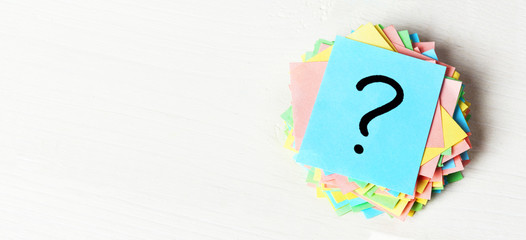 colorful question marks written reminders tickets. ask or business concept