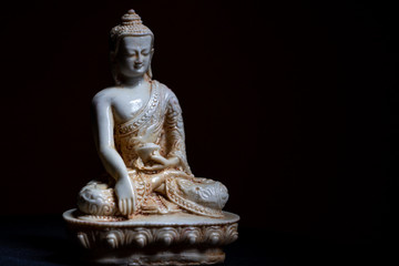 A ceramic statue from Gautama Buddha.