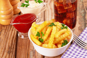 french fries on wooden table