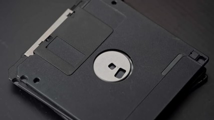 3.5-inch floppy disks stacked on top of each other - Powered by Adobe
