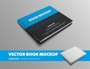 Mockup of a closed book in blue and black with an abstract pattern isolated on a gray background.