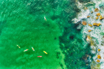 Fototapeta na wymiar D Sea turimetta surfers top down