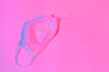 Medical protective mask on neon background, Prevent Coronavirus, protection factor for wuhan virus, With clipping path