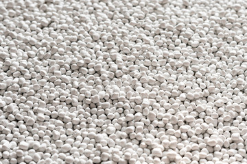 White polymer dye in granules, background texture