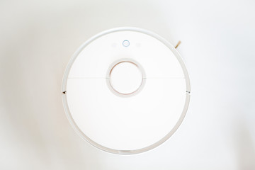  white robot cleaner on a white background