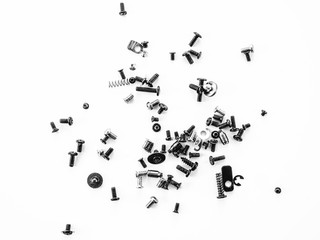 Minimalist backdrop with isolated small connection pieces from hardware reparation