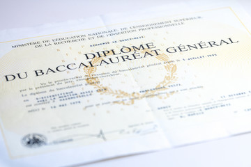 Baccalaureate certificate on a wooden table in France