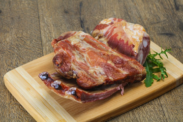 Smoked pork ribs over the wooden background