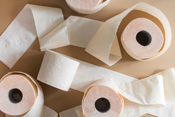 toilet paper chaos peach beige color on beige background
