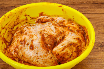 Raw marinated chicken for cooking