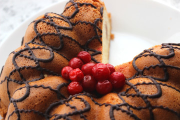 cake with fresh cherry on dark background, top view, copy space