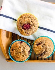 banana and raspberry muffin close up in the kitchen table