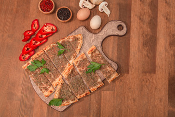 turkish pita on wooden board