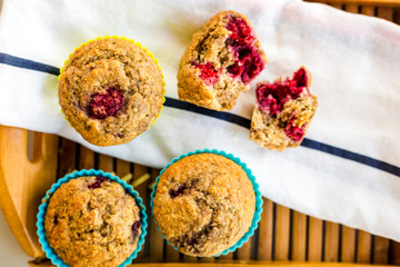 banana and raspberry muffin close up in the kitchen table