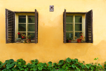 Traditional windows on the streets of the medieval city of Sighisoara