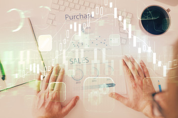 FOREX chart multi exposure with work table background.