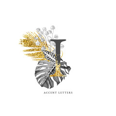Decorated I letter with hand drawn tropical leaves