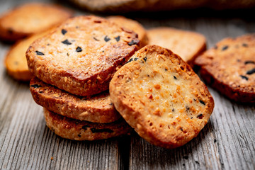 Salted crispy crackers with sesame and sunflower seeds