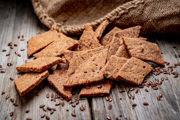 Salted crispy crackers with sesame and sunflower seeds