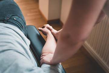 Fototapeta premium Physiotherapist treating patient for various physical ailments