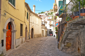 A narrow street between the houses of Morcone, a medieval village in the Campania region in Italy