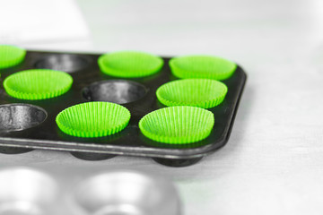 Obraz na płótnie Canvas Cupcake baking dish. Professional cooking tools a