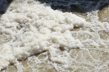 Foaming water in a river, Germany, Europe