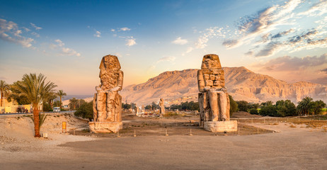 Colossi of Memnon at sunset - obrazy, fototapety, plakaty