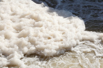 Fototapeta na wymiar Foaming water in a river, Germany, Europe