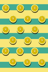 Seamless pattern with lemon slices on colored surface in geometric design.