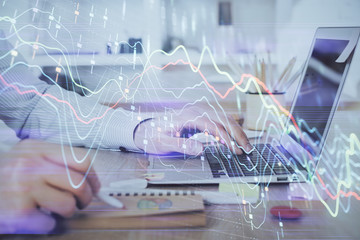 Multi exposure of stock market chart with man working on computer on background. Concept of financial analysis.