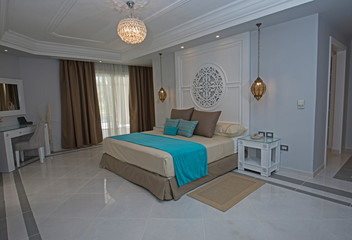 Double bed in a luxury suite of a hotel room