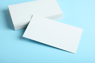 business cards on a colored background top view. Place to insert text