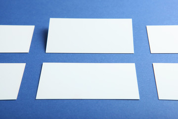 business cards on a colored background top view. Place to insert text