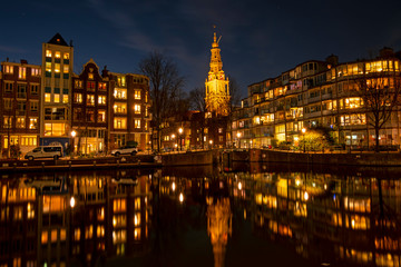 Fototapeta na wymiar City scenic from Amsterdam with the Zuiderkerk in the Netherlands at night