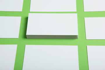 business cards on a colored background top view. Place to insert text