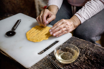 Food preparation for a traditional sweet in portugal called Filhós.