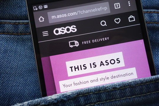 KONSKIE, POLAND - MAY 19, 2018: ASOS website displayed on smartphone hidden in jeans pocket