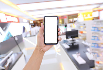 Hand holding smartphone with white Background. Clipping Patch.