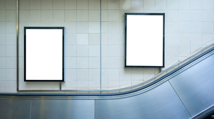 Blank billboard mock up on the wall in subway station. Advertising concept
