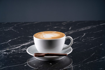 Coffee, espresso in white cup of marble table background. Top view. stock photo